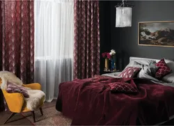 Burgundy color curtains in the living room interior