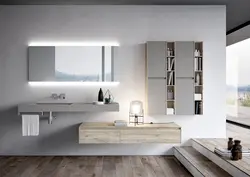 Bathtub with hanging cabinet photo