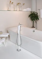White Faucets In The Bathroom Interior