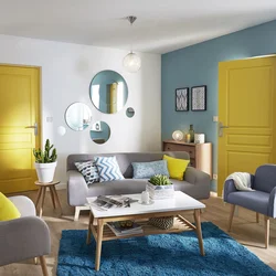 What color goes with yellow in the living room interior