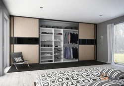 What types of wardrobes are there in the bedroom photo