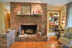 Brick fireplace in the living room photo