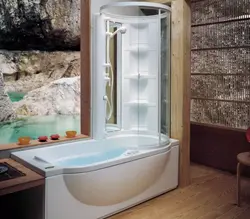 Bathtub and shower cabin in one photo