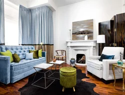 Living room with blue sofa and blue curtains photo