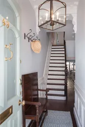 Photo of a small hallway with stairs