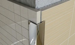 Photo of corner of bathtub tiles
