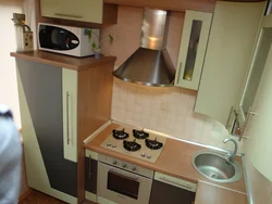 Corner kitchens for a small kitchen photo with a refrigerator and stove