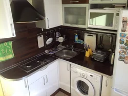 Corner kitchens for a small kitchen photo with a refrigerator and stove