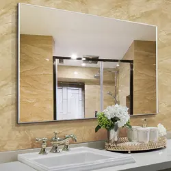 Bath interior with large mirror