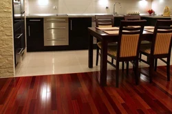 Laminate In The Living Room And Tiles In The Kitchen Photo