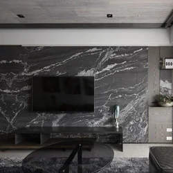 Marble on the walls in the interior of the living room apartment