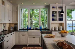 Kitchen design with two windows on different walls 20 sq.