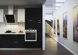 White kitchen black appliances in the interior