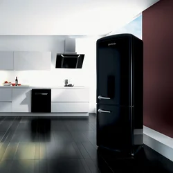 White kitchen black appliances in the interior