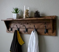 Wooden hangers for the hallway wall photos