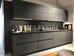 Gray Kitchen With Dark Countertops In The Interior Photo