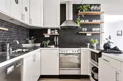 Gray Kitchen With Dark Countertops In The Interior Photo