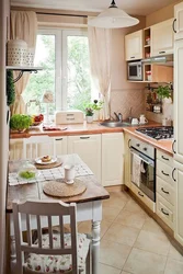 Interior Of A Small Kitchen With A Refrigerator Photo