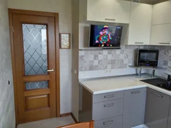 Corner kitchen design 9 sq.m. with TV photo