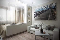Photo of the design of a one-room apartment with a loggia