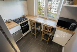Kitchen Design In Khrushchev With A Window Sill And Countertop