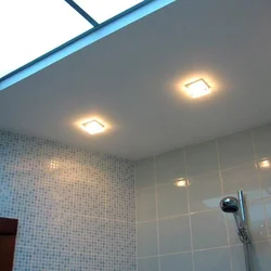 Lamps in the suspended ceiling in the bathroom photo
