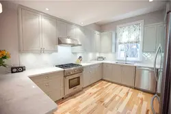 Beige wooden kitchen in the interior