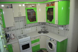 Design of a small corner kitchen with a refrigerator and washing machine