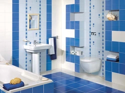 Bathtub made of cheap tiles photo