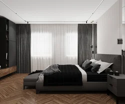 Photo of a bedroom with a dark bed