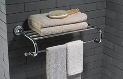 Полотенца в интерьере ванной комнаты фото