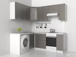 Kitchens with a washing machine under the countertop corner photo