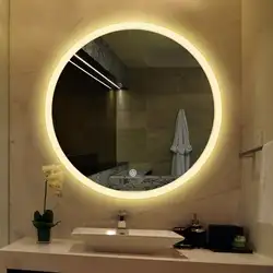 Bathtub with round mirror photo