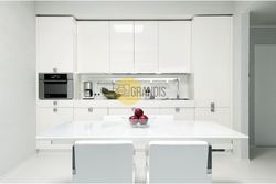 White glossy kitchens in a modern style interior photo