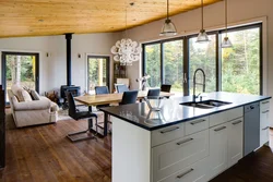 Kitchen living room with panoramic windows in the house design photo