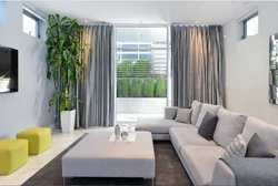 Living Room Design With Gray Sofa And Curtains