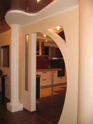 Arches from the hallway to the kitchen photo