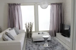 Gray walls in the living room interior, which curtains are suitable