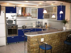Kitchens For 10 With A Bar Counter Photo