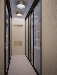 Design of a long hallway in an apartment photo with a wardrobe