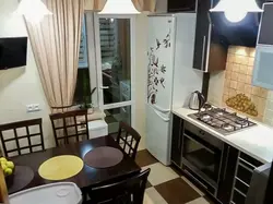 Kitchen interior in an apartment 6 sq m with a balcony