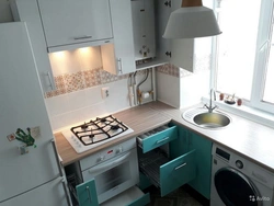 Kitchen options in Khrushchev with a refrigerator and a gas water heater photo