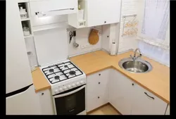 Kitchen Options In Khrushchev With A Refrigerator And A Gas Water Heater Photo