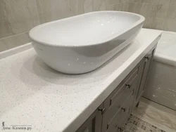 Sink In A Stone Countertop In A Bathroom Photo