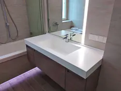 Sink In A Stone Countertop In A Bathroom Photo