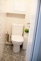 Toilet design in an apartment with pipes