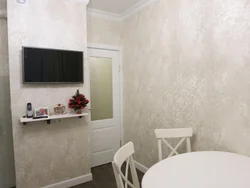 Plastering walls in the kitchen interior