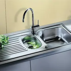 Stainless steel kitchen sink photo