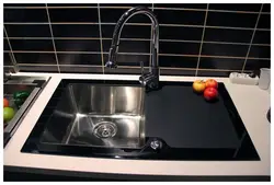 Stainless steel kitchen sink photo