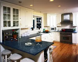 Photo of a designer kitchen in the house